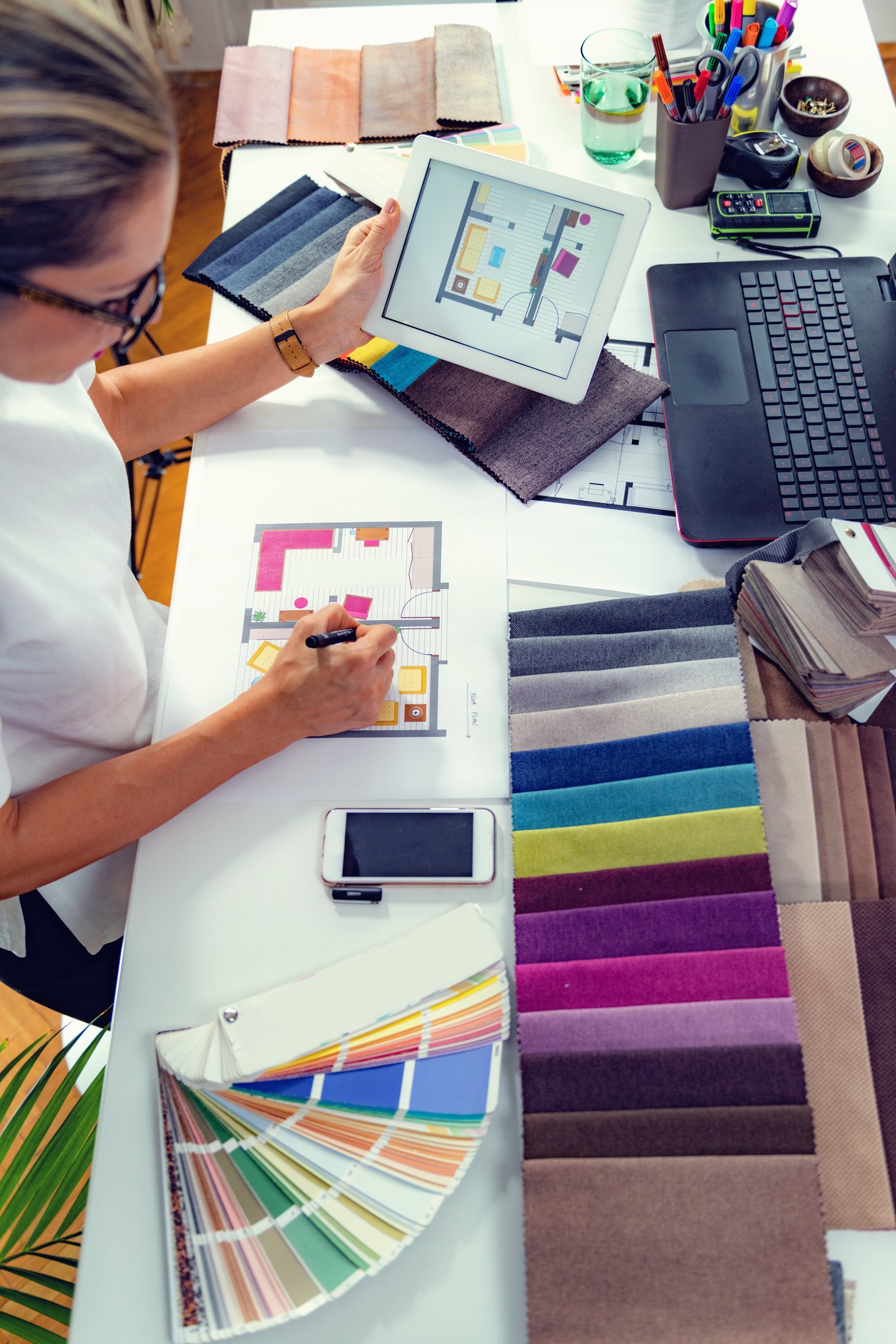 Architect, interior designer, looking at samples